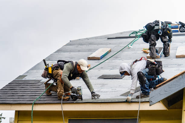 Professional Roofing technician working in Augusta, ME